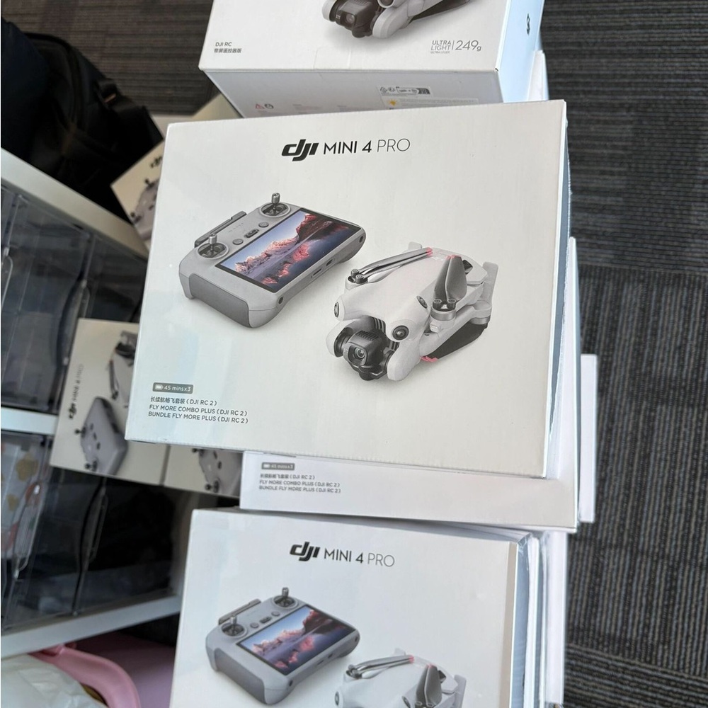 DJI Mini 4 Pro Drone in White with Controller